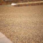 Gold mixed aggregate resin patio in Tatsfield